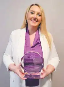Briean-Clark-holding-award